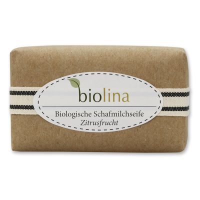 Biolina Schafmilchseife 200g verpackt mit braunem Papier und Dekoband gestreift, Zitrusfrucht 