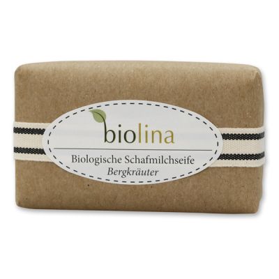 Biolina Schafmilchseife 200g verpackt mit braunem Papier und Dekoband gestreift, Bergkräuter 