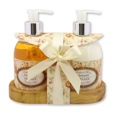 Body milk 250ml and liquid soap 250ml on a wooden shelf "Vintage-Motiv 20", Orange 