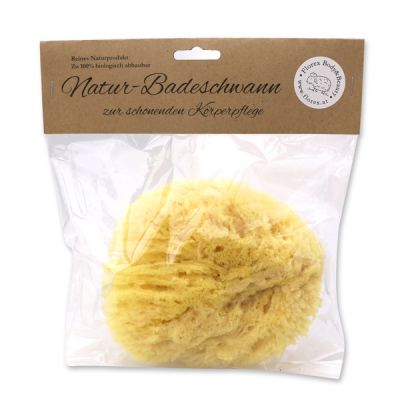Natural bath sponge 15cm  in cellophane with a label 
