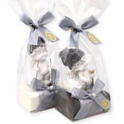Sheep milk soap 100g decorated with an angel 'Igor'-skier in a cellophane, Christmas rose white/silver 